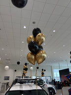 Bouquet de 7 ballons à l'hélium noir et or